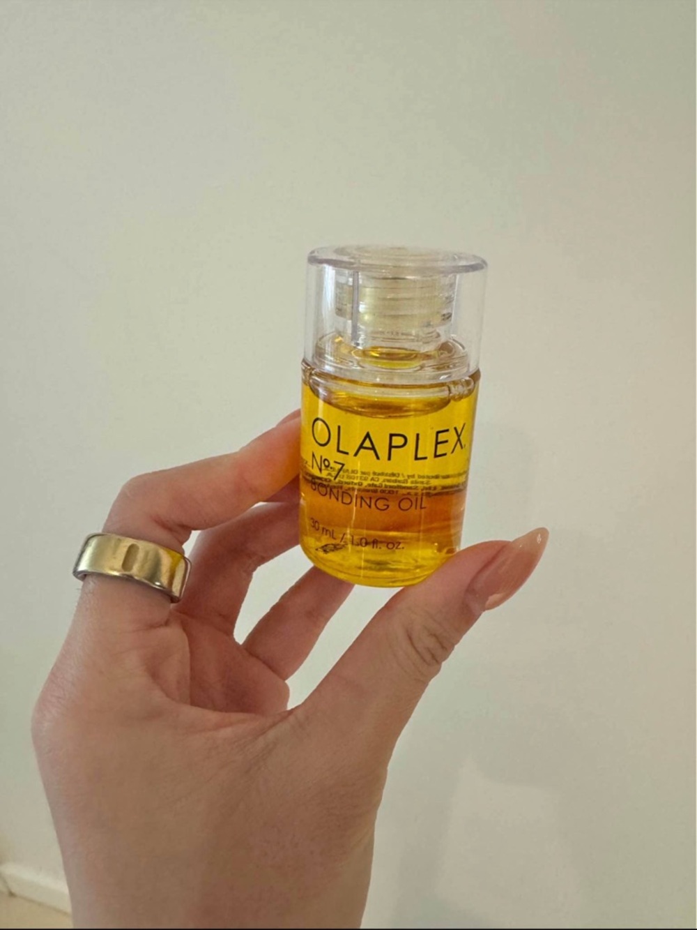 OLAPLEX No.7 Bonding Oil — Clear Cap with Yellow Oil